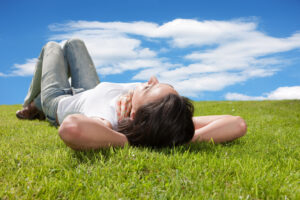 Laying on grass is a great way to practice grounding