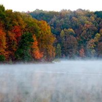 Fog settles over a lake in Mohican