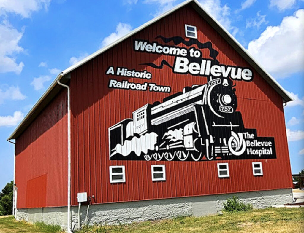 A railroad mural on a barn in Bellvue, Ohio