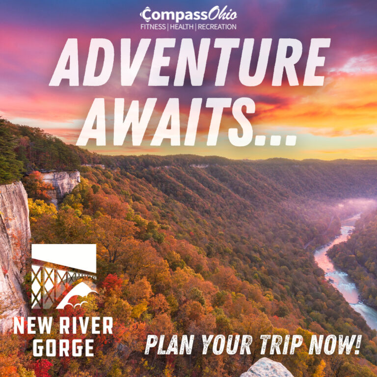 Image for advertising of New River Gorge showing the tree lines gorge in colors of red and gold with a river in the distance