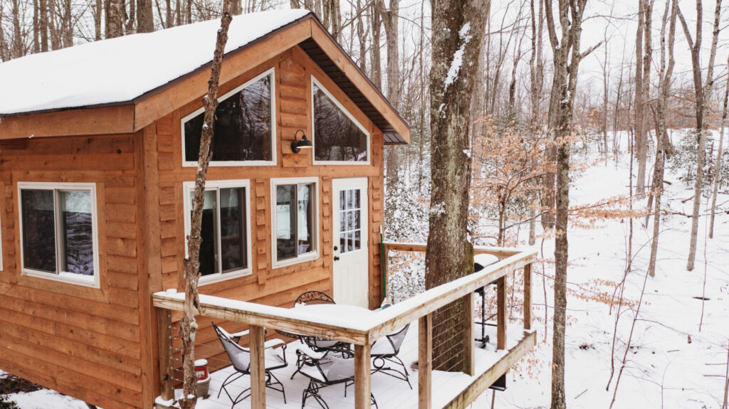 A cabin covered in snow in the New River Gorge