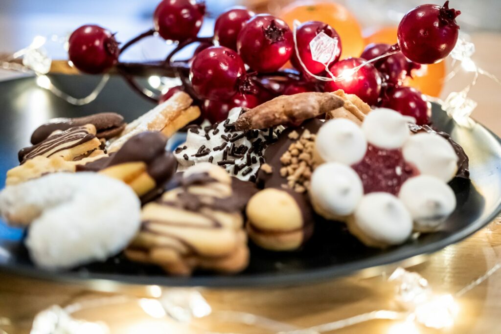 A plate of assorted styles of Christmas cookies from around the world