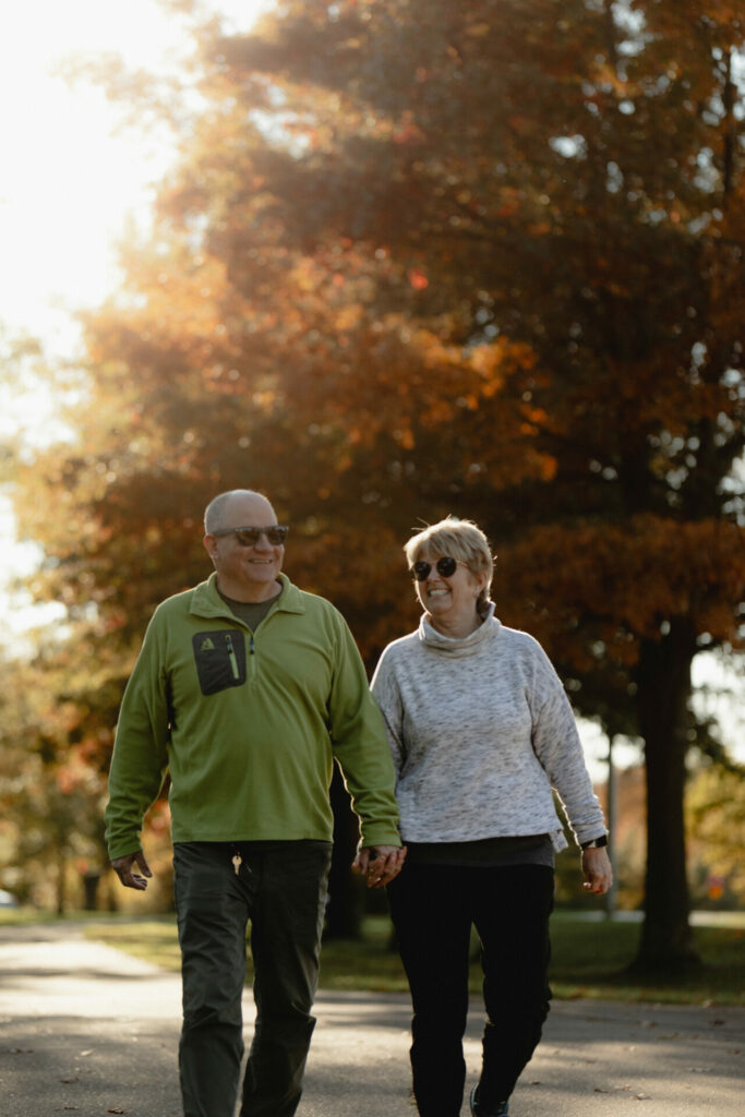 A man and woman enjoying a leisurly stroll along the Knox County Cycling Path