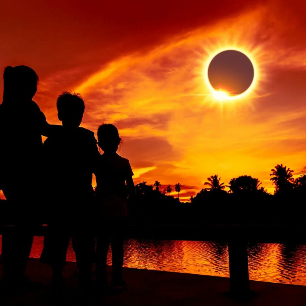 A family watching the solar eclipse path of totality
